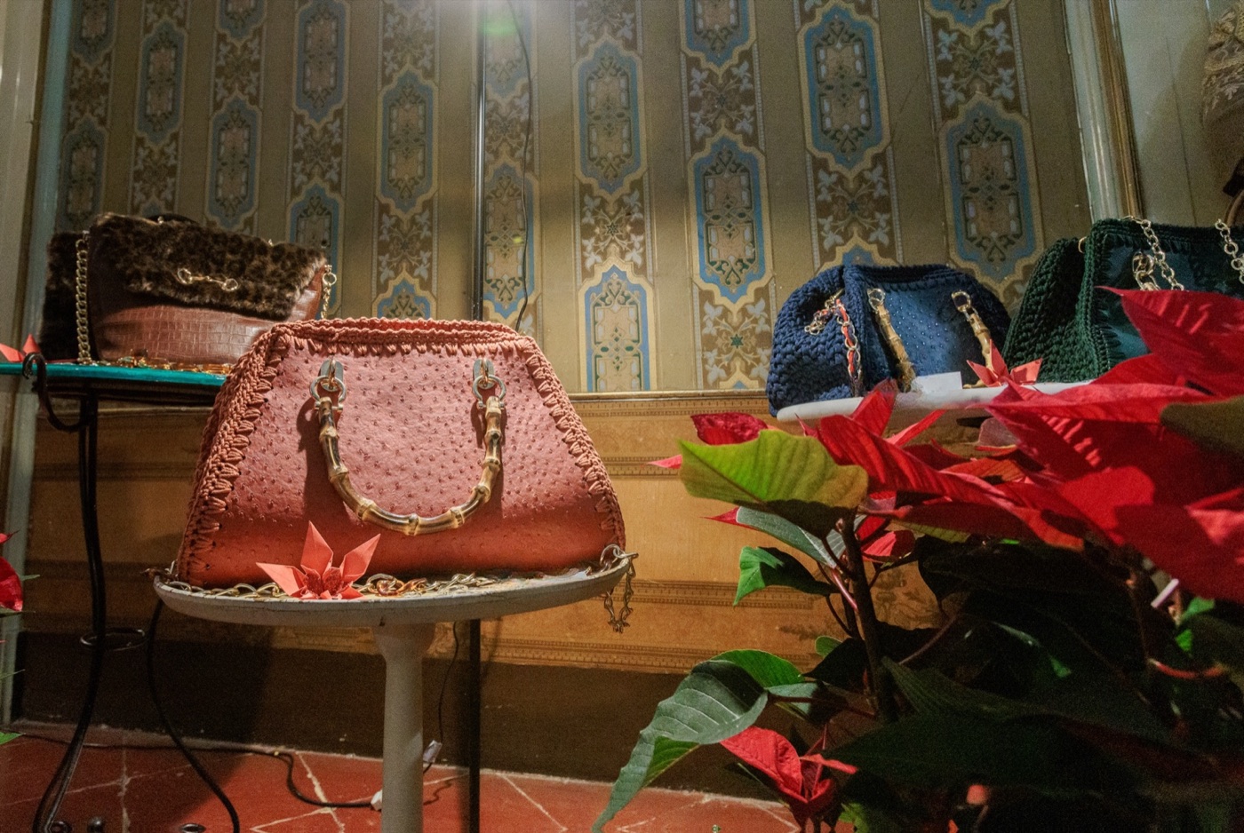 Pink ostrich-embossed leather bag with bamboo handle